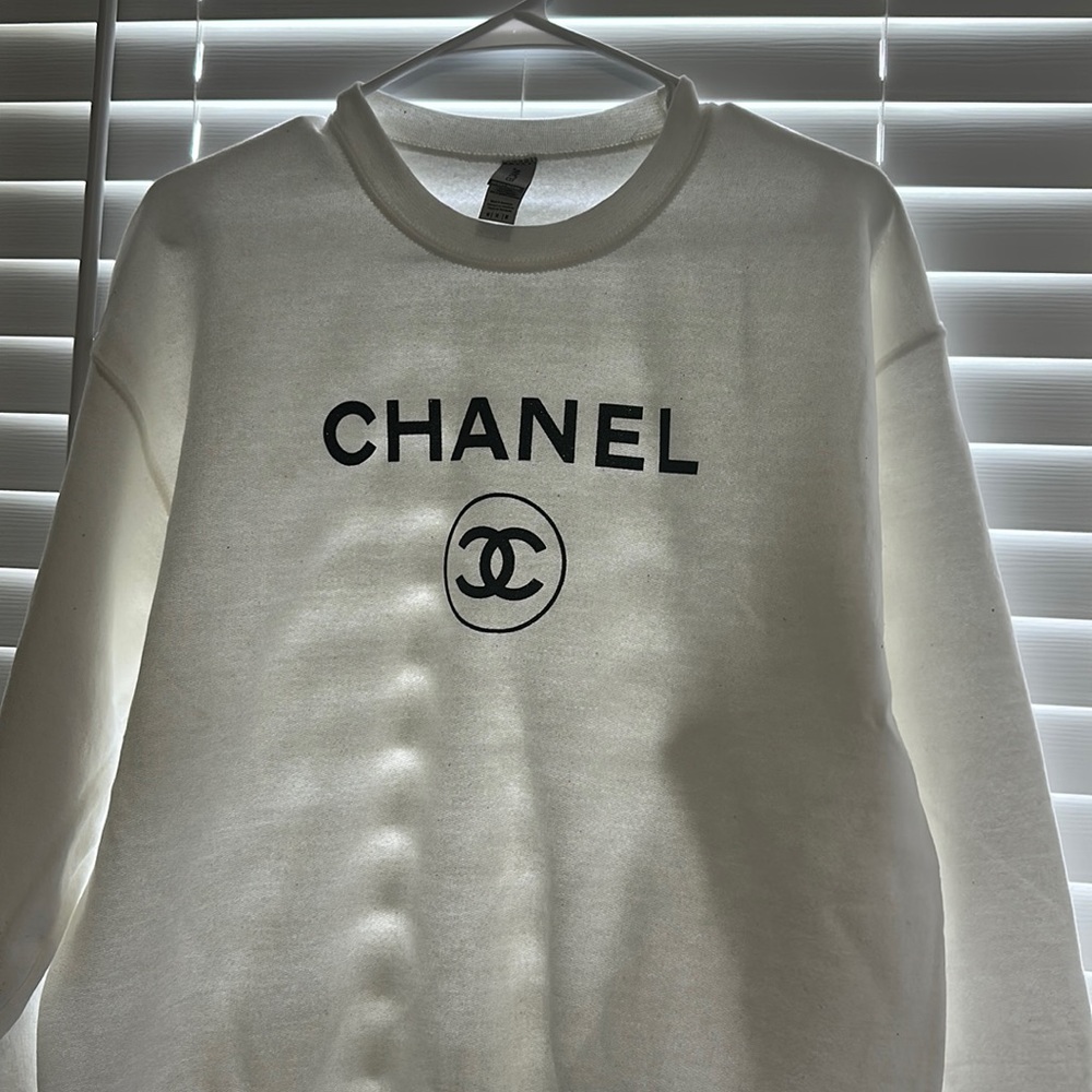 White sweatshirts with black glitter